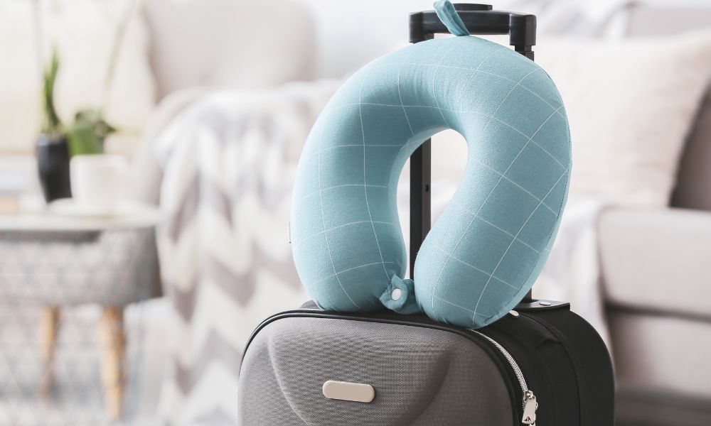 Suitcase and travel pillow